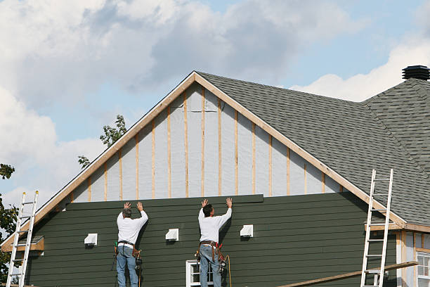 Professional Siding Installation technician working in Henrico, NC